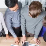 Four business colleagues