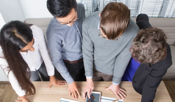 Four business colleagues